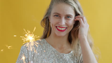 woman celebrating with sparkler
