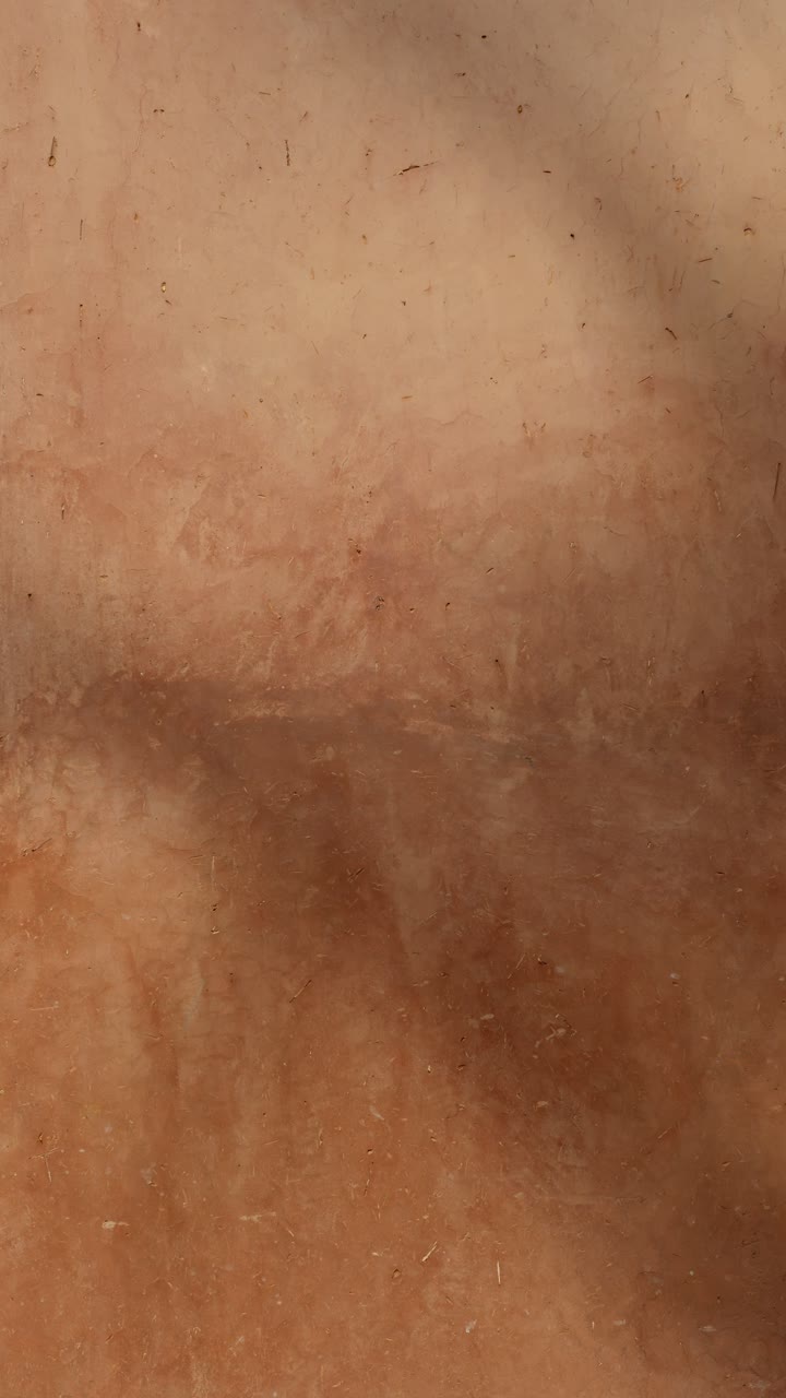 Warm shades of Marrakesh wall create calm and cultural ambiance