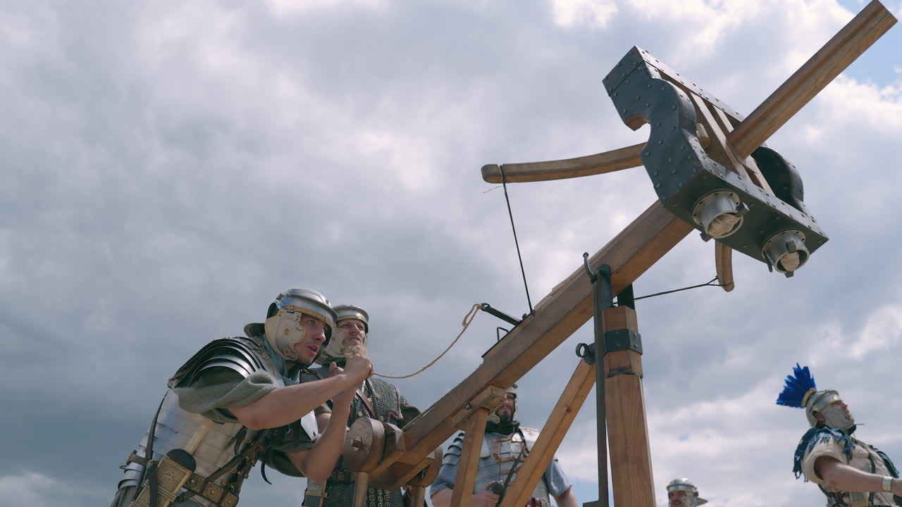 Roman Soldiers Operating a Catapult
