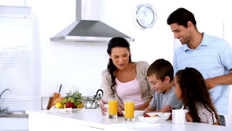 family having breakfast together