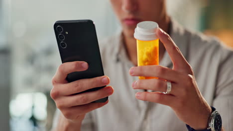 man with phone and prescription medicine
