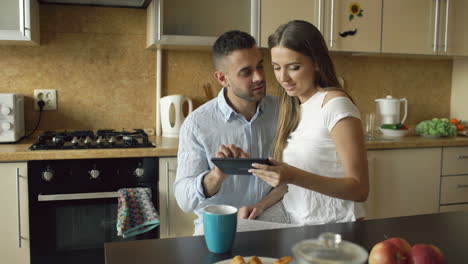 couple enjoying time together in the kitchen