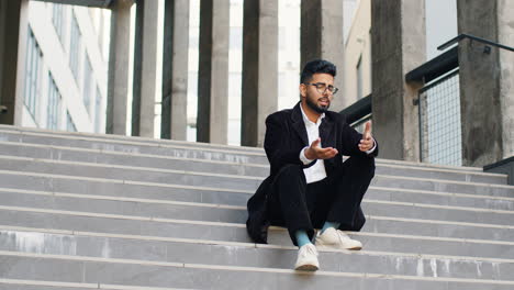 Unhappy-sad-Indian-business-man-frustrated-stress-pensive-feeling-bad-after-company-unemployment