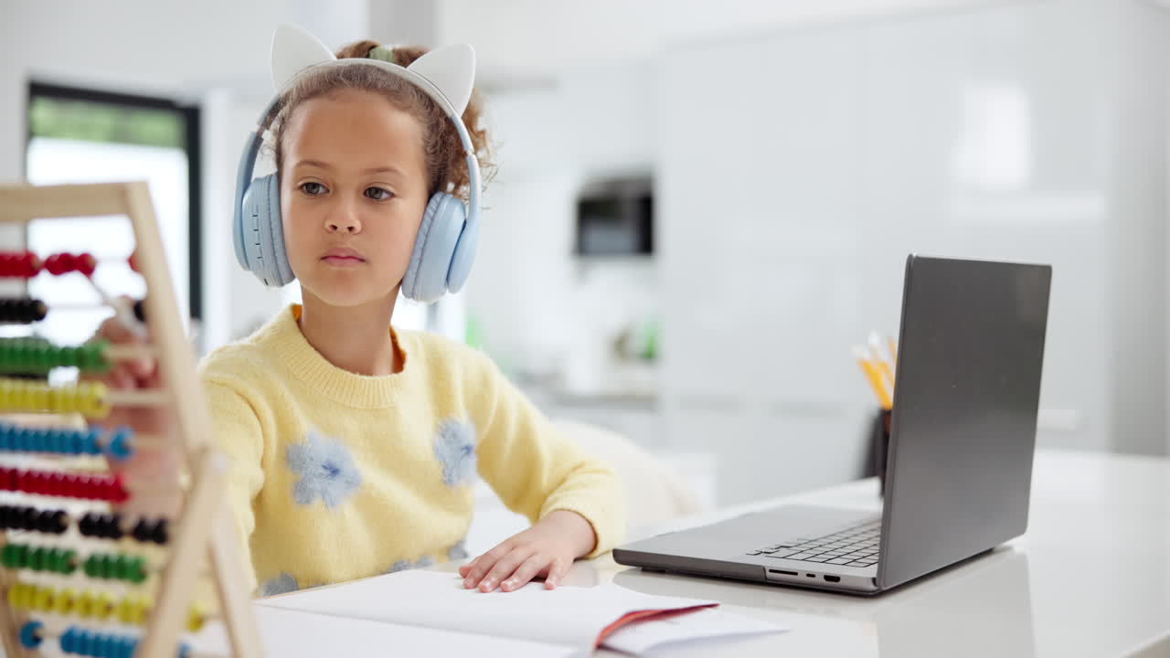 Girl Studying at Home with Laptop and Abacus