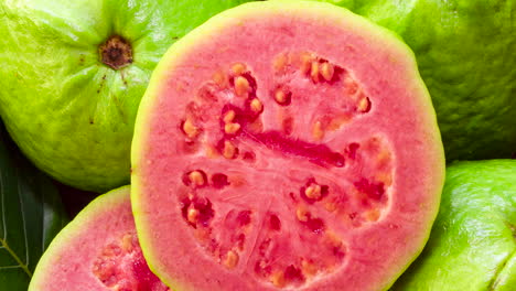 closeup-on-red-guavas-cut-in-basket