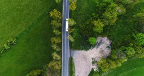 Truck-On-A-Cinematic-Road-Vista-Aérea-Shot-4K