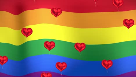 animación de corazones flotando sobre la bandera del arco iris