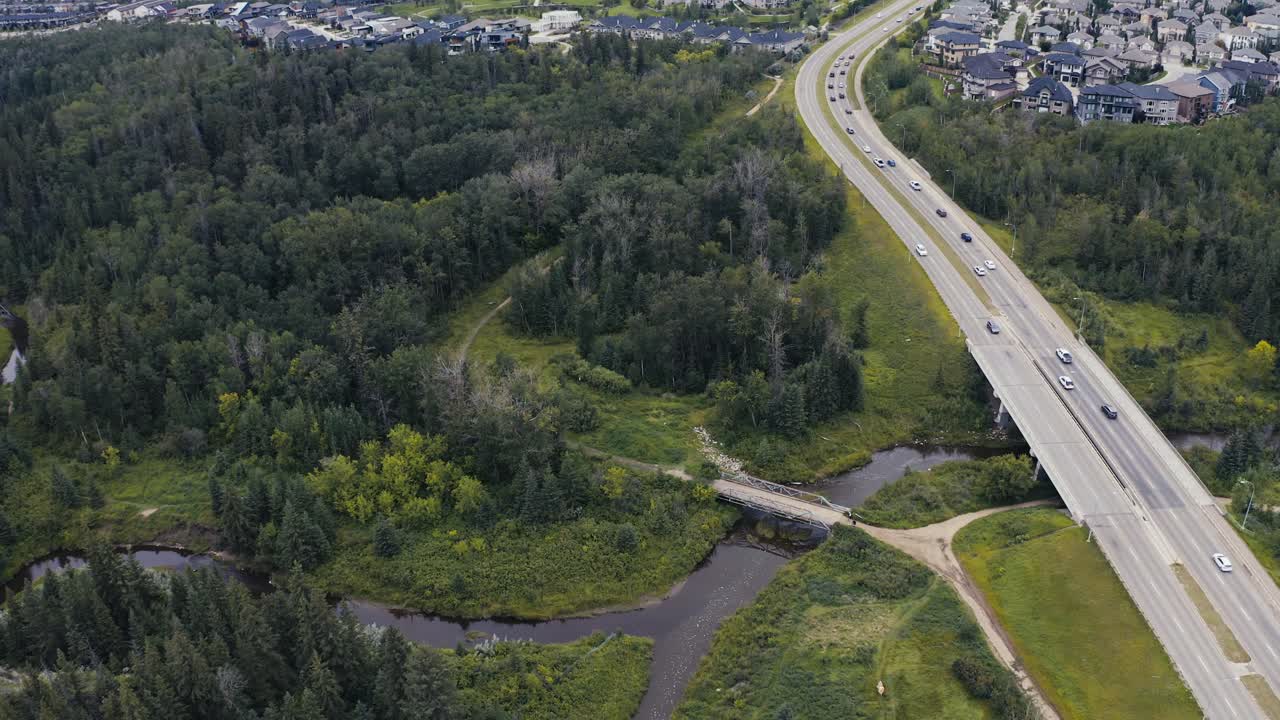 cookiecut town forest river hwy bridges aerial overlooking valley