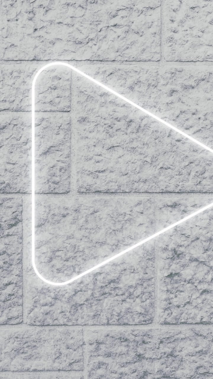 Insegna al neon pollice verso su muro di mattoni 4k