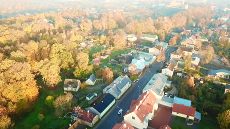 drone chasing a fast moving car in rakvere, autumn