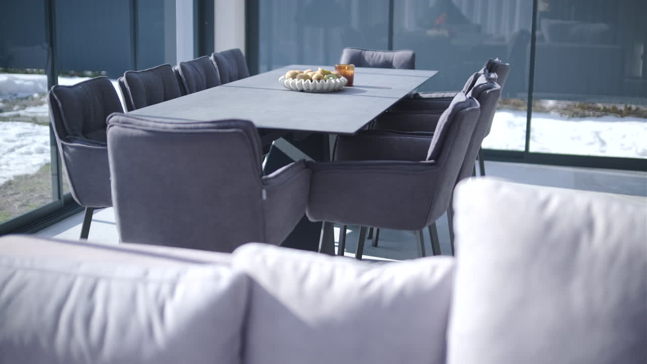 Modern Dining Table in a Luxury Home with Winter View