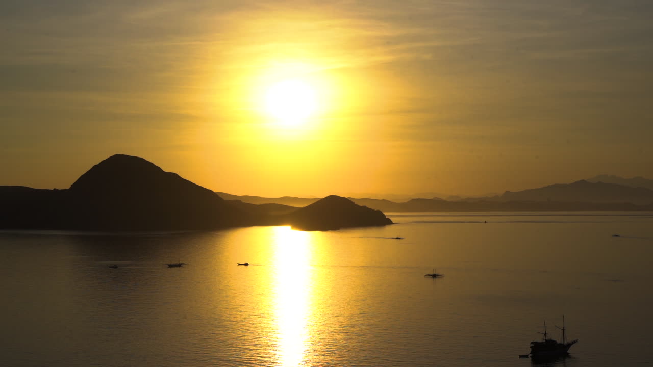 Sunlight Reflection On The Calm Sea During Golden Hour In Bali, Indonesia. wide shot