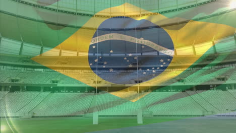 flag blowing in front of a stadium