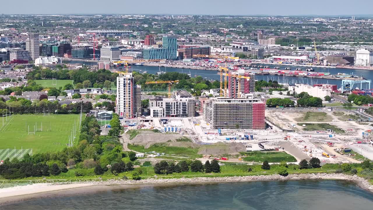 Construction of apartments in Dublin, housing crises Ireland. Aerial cityscape, sunny day.