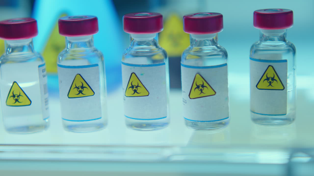 Set of Glass Vials with Biohazard Stickers in Chemistry Lab