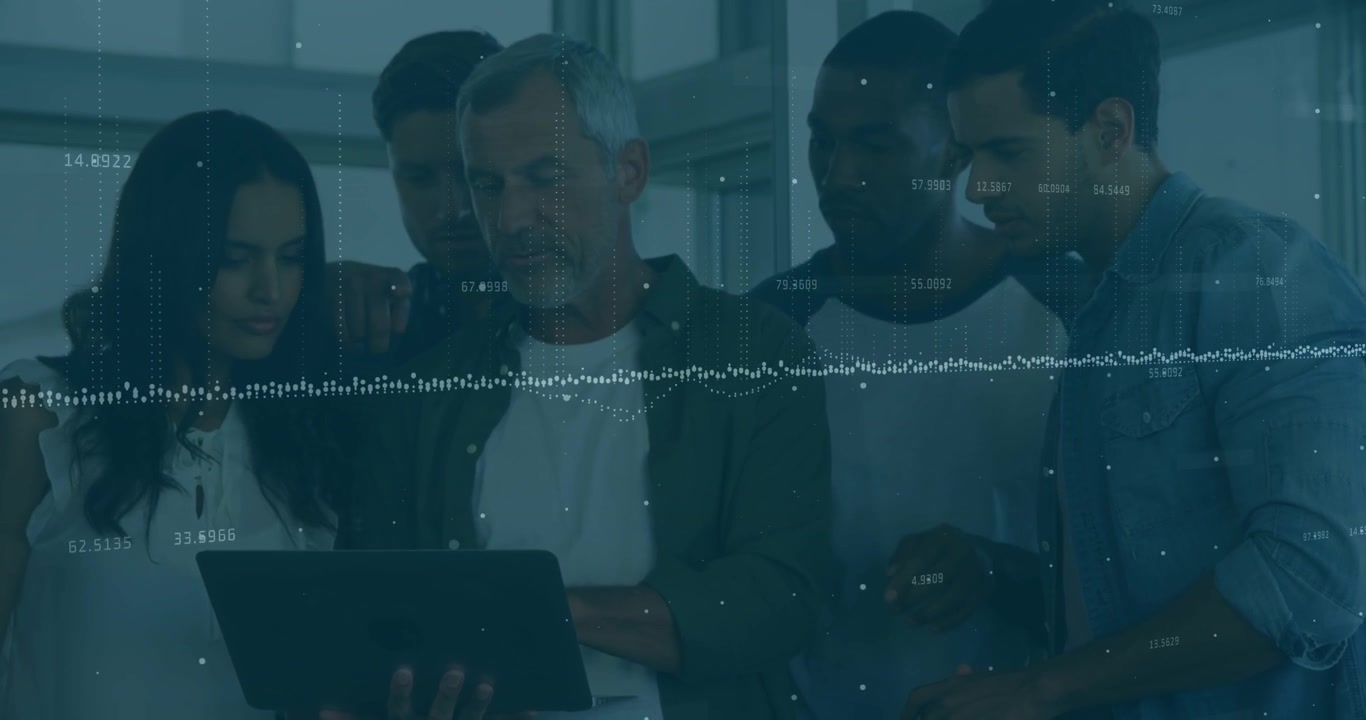 Diverse Business Team Collaborating on Laptop with Digital Data Overlay