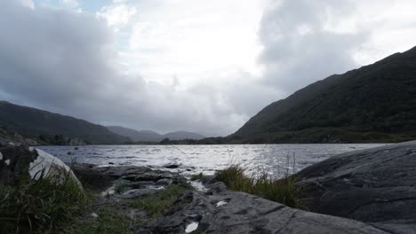 national park time lapse of cloudy sky and lake between hills, ireland