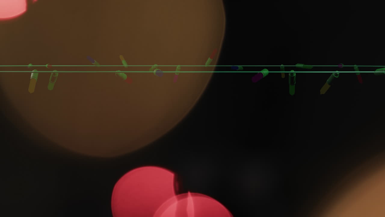 검은 바탕에 떨어지는 크리스마스 요정 불빛과 눈의 애니메이션