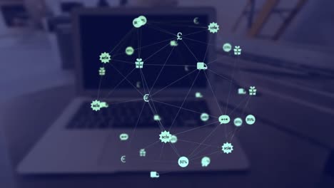 Animación-Del-Globo-De-Iconos-Digitales-Contra-El-Primer-Plano-De-Una-Computadora-Portátil-Sobre-Una-Mesa