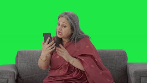 Angry-Indian-old-woman-shouting-on-video-call-Green-screen