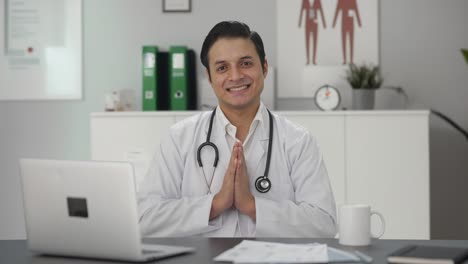 happy indian doctor doing namaste and greetings