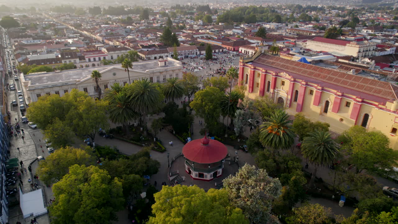 In San Cristobal de las Casas, the town square glows at sunset &mdash; a charming convergence of tradition and twilight allure
