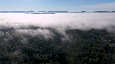 cloud ceiling with brushy mountains in the background near wilkesboro nc, north carolina
