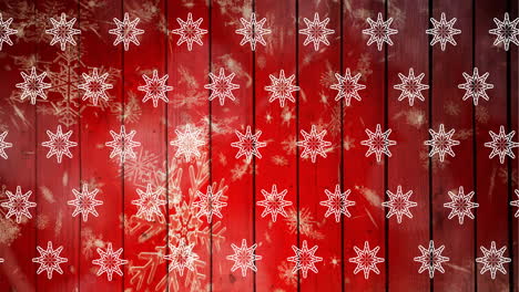 Animation-of-snowflakes-falling-on-red-background