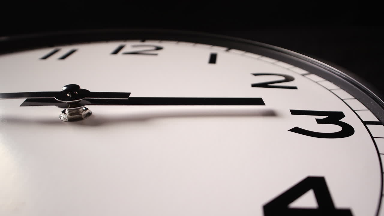 ZOOM OUT, CLOSEUP - modern unbranded clock in timelapse