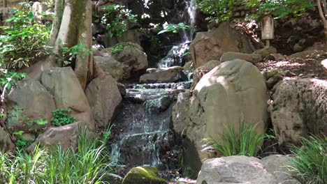 Close-up-the-view-of-the-little-waterfall-in-Shiba-park