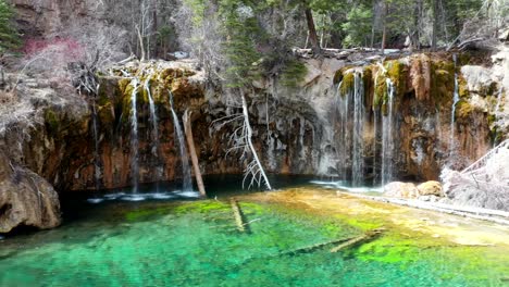 Drone-shot-of-the-Hanging-Lake-and-waterfalls-in-Glenwood-Canyon,-Colorado