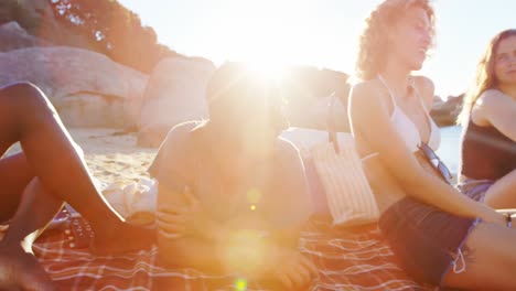 group of friends relaxing in the beach 4k