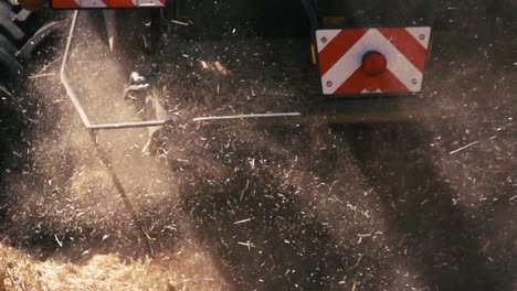 Slowmotion-Auf-Wheat-Dust-Behind-A-Combine-Harvester-In-Magdeburg,-Germany