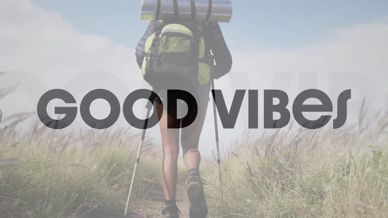 Animasjon av ordene good vibes i svart over en kvinne som vandrer på landet