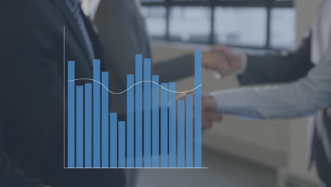 statistical data processing against mid section of businesspeople shaking hands at office