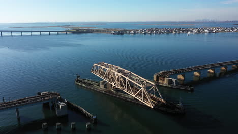 an aerial drone shot over grassy bay in queens, ny