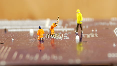 figurine of manual worker working