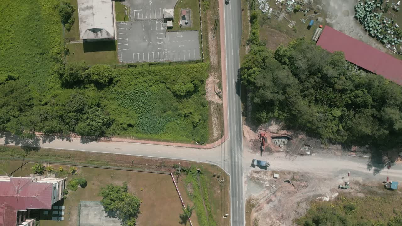 Aerial Drone View, Serian District Town ,Summer With Beautiful Green Trees,New Building And Water Park Lake, Water From The Mountain Sarawak,Borneo.
