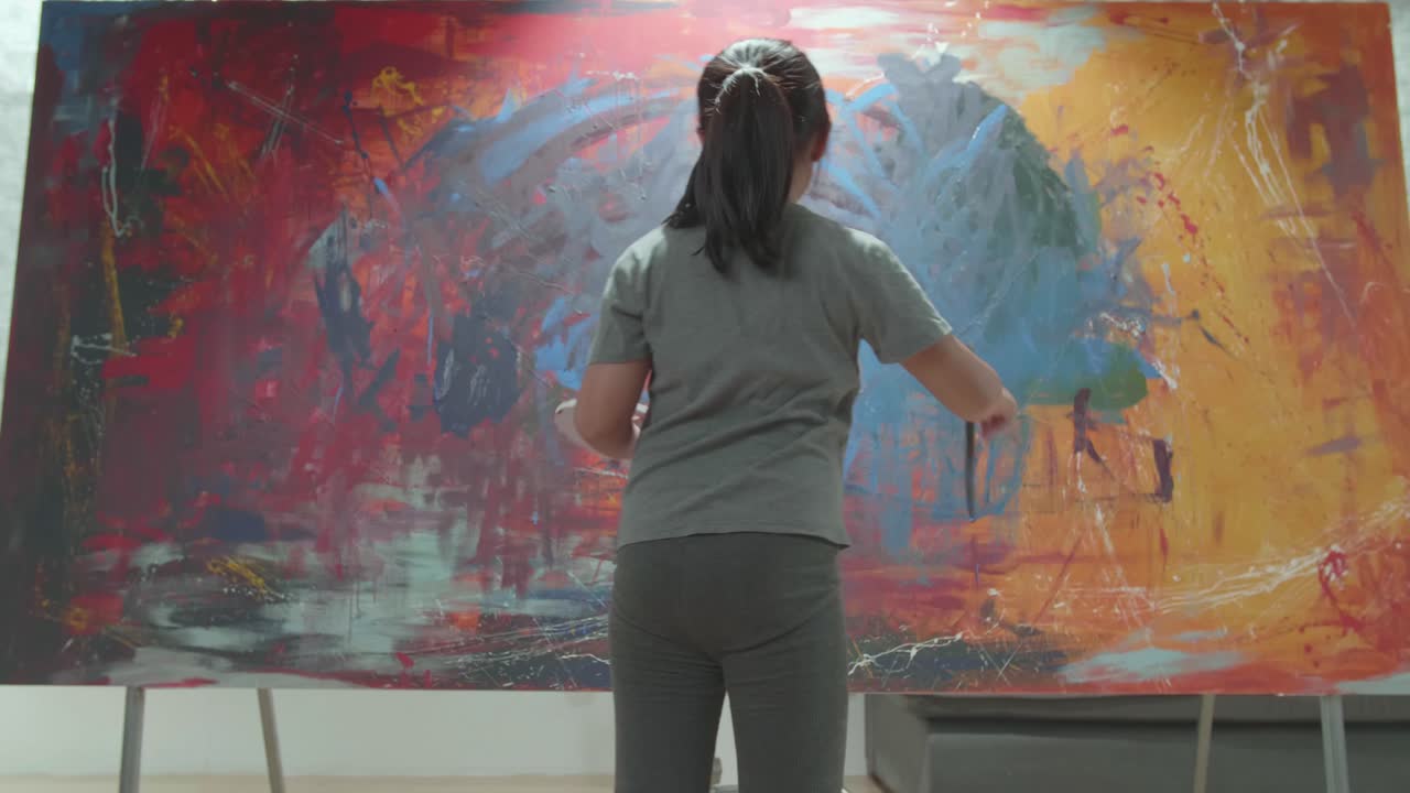 Young Artist Painting Abstract Art