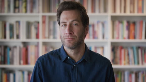 portrait-attractive-young-man-turns-head-looking-confident-successful-entrepreneur-in-library-bookstore-background-slow-motion