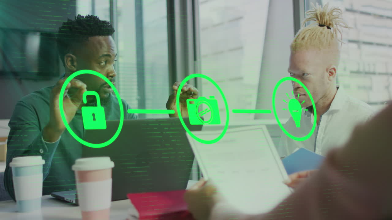 Animation of flowchart of icons over diverse coworkers discussing reports on laptop in office