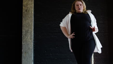 woman dancing indoors