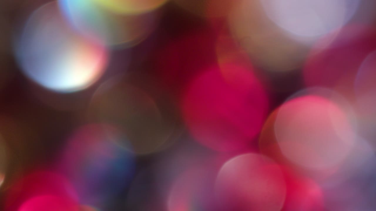 la rotación de los círculos bokeh en el sentido de las agujas del reloj