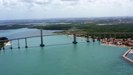 rotating aerial shot of the newton navarro bridge, one of the biggest cable-stayed bridges in brazil