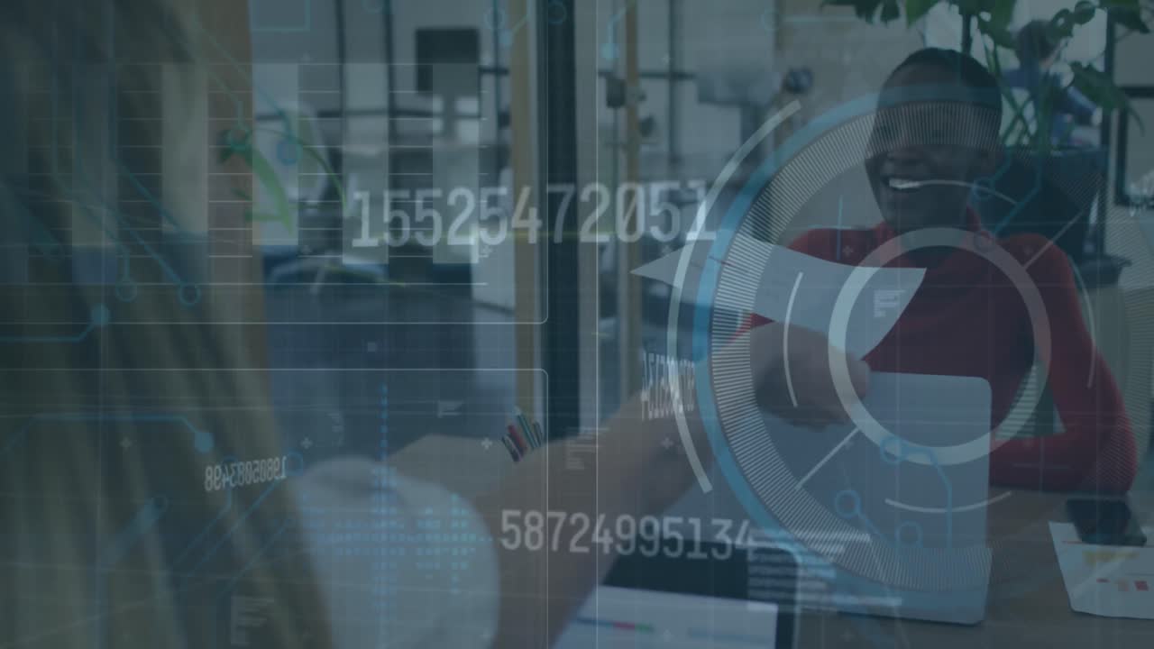 Animation of scanner processing data over two happy diverse women passing document in office