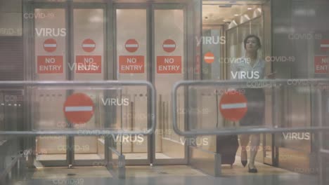Digital composite video of virus text againstwoman carrying a suitcase walking out of an airport