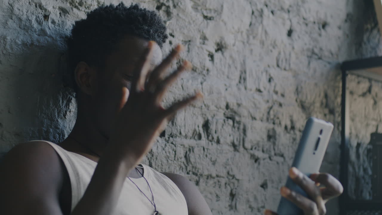 Young Man Using Smartphone