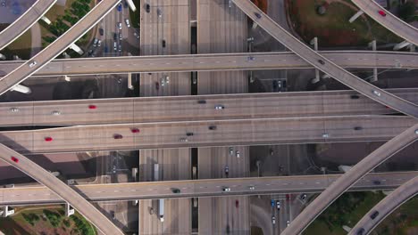 birds eye drone view of traffic on i-10 west and beltway 8 freeway in houston, texas