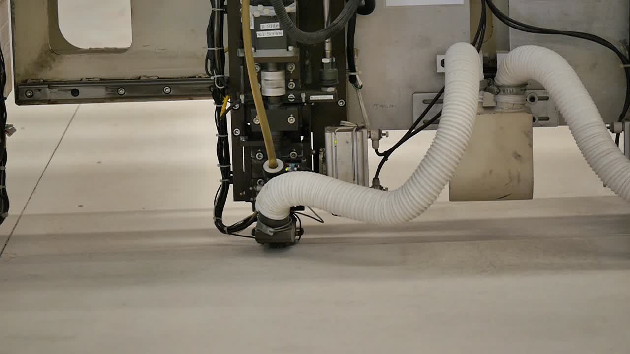Robot Working in Heavy Metal Factory