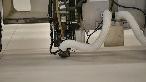 robot working in heavy metal factory